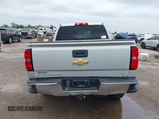 2016 Chevrolet Silverado 1500 LT with VIN 3GCPCREC1GG117881, listed as a IAAI auction lot 42106305 with 164,510 mi miles and . Bid and sale history available at DreamBid. Image 16.