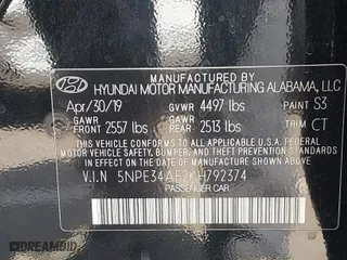 2019 Hyundai Sonata Sport with VIN 5NPE34AF2KH792374, listed as a IAAI auction lot 41987740 with 77,209 mi miles. Bid and sale history available at carsss.com. Image 9.