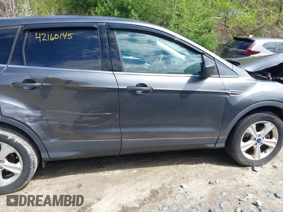 2016 Ford Escape SE z VIN 1FMCU9GX2GUA47702, wystawiony jako IAAI lot #42160145 z przebiegiem 90 765 mil mil oraz . Historia ofert i sprzedaży dostępna na DreamBid. Obrazek 14.