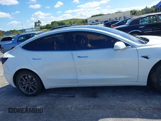 2020 Tesla Model 3 Standard Range Plus with VIN 5YJ3E1EA8LF783631, listed as a IAAI auction lot 40696383 with 78,889 mi miles. Bid and sale history available at carsss.com. Image 12.
