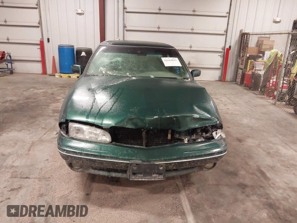 1997 Pontiac Bonneville SE z VIN 1G2HX52KXVH250272, wystawiony jako IAAI lot #41644041 z przebiegiem 160 791 mil mil oraz . Historia ofert i sprzedaży dostępna na DreamBid. Obrazek 13.