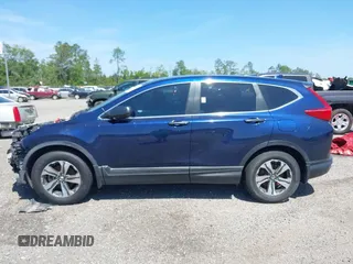 2019 Honda CR-V LX with VIN 2HKRW5H39KH400453, listed as a IAAI auction lot 40041024 with 76,932 mi miles and . Bid and sale history available at carsss.com. Image 15.
