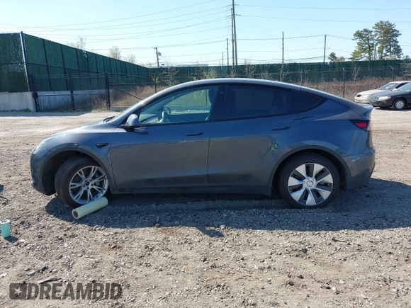2022 Tesla Model Y Long Range with VIN 7SAYGDEE2NF460945, listed as a IAAI auction lot 41921645 with 62,318 mi miles and . Bid and sale history available at DreamBid. Image 13.