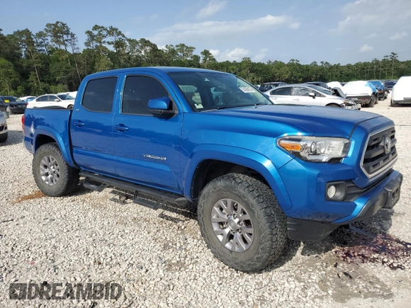 2017 Toyota Tacoma SR5 with VIN 5TFAZ5CN4HX051289, listed as a Copart auction lot 54206125 with 98,429 mi miles and Salvage Title. Bid and sale history available at DreamBid. Image 4.