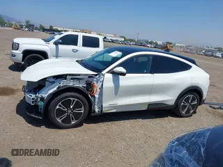 2021 Ford Mustang Mach-E Select z VIN 3FMTK1RM1MMA49774, wystawiony jako IAAI lot #42462914 z przebiegiem 16 754 mil mil oraz . Historia ofert i sprzedaży dostępna na DreamBid. Obrazek 15.