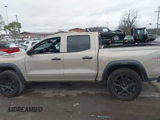 2023 Chevrolet Colorado 4WD Trail Boss with VIN 1GCPTEEK8P1239877, listed as a IAAI auction lot 40893691 with 30,617 mi miles. Bid and sale history available at carsss.com. Image 14.