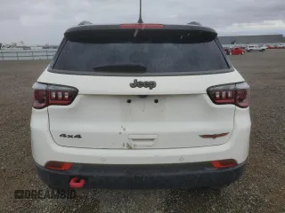 2019 Jeep Compass Trailhawk with VIN 3C4NJDDB4KT790351, listed as a Copart auction lot 48588285 with 67,417 mi miles and Salvage Title. Bid and sale history available at DreamBid. Image 6.