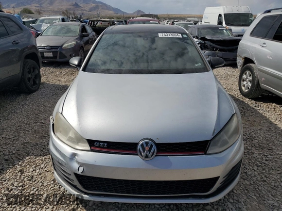2015 Volkswagen GTI SE with VIN 3VW4T7AU6FM007265, listed as a Copart auction lot 74313094 with 141,628 mi miles and Salvage Title. Bid and sale history available at DreamBid. Image 5.