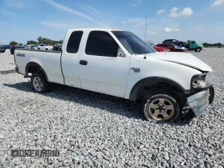 2003 Ford F-150 XL z VIN 2FTRX18WX3CA73133, wystawiony jako Copart lot #58734795 z przebiegiem 197 519 mil mil oraz Szkoda całkowita • Salvage title. Historia ofert i sprzedaży dostępna na DreamBid. Obrazek 4.