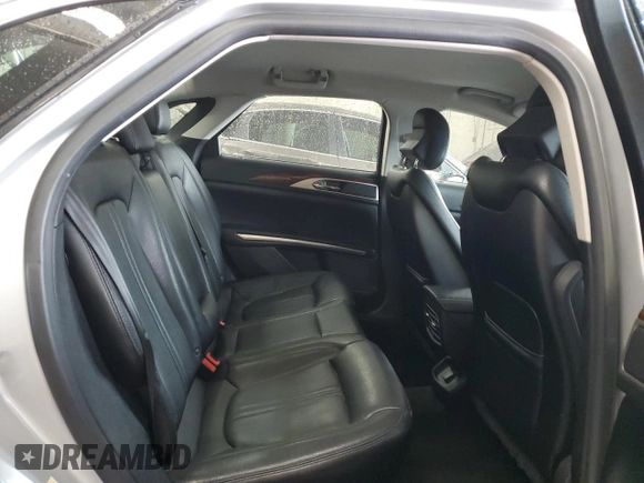 2015 Lincoln MKZ z VIN 3LN6L2GK4FR613117, wystawiony jako Copart lot #54141735 z przebiegiem 129 072 mil mil oraz Szkoda całkowita • Salvage title. Historia ofert i sprzedaży dostępna na DreamBid. Obrazek 10.