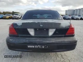 2005 Ford Police Interceptor with VIN 2FAFP71W35X128684, listed as a Copart auction lot 54002165 with 144,766 mi miles and Clean title. Bid and sale history available at DreamBid. Image 6.