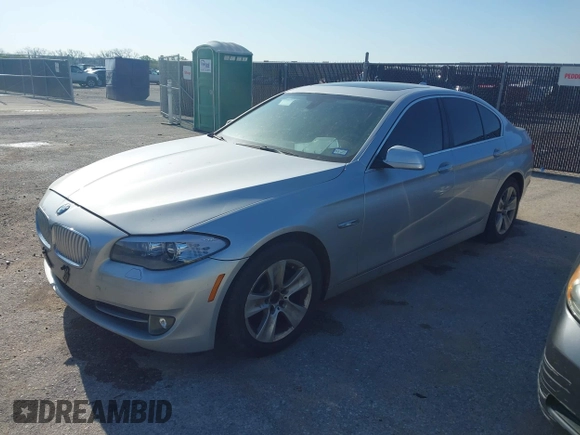 2013 BMW 5 Series 528i xDrive with VIN WBAXH5C5XDD114174, listed as a IAAI auction lot 41934972 with 127,193 mi miles. Bid and sale history available at carsss.com. Image 2.