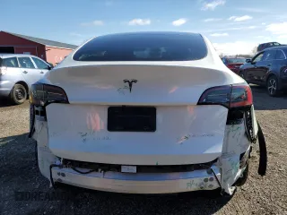 2023 Tesla Model Y Long Range z VIN 7SAYGAEE2PF758235, wystawiony jako Copart lot #49059895 z przebiegiem 57 615 mil mil oraz Czysty tytuł • Clean title. Historia ofert i sprzedaży dostępna na DreamBid. Obrazek 6.