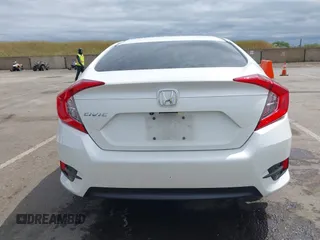 2016 Honda Civic EX with VIN 19XFC2F70GE237560, listed as a IAAI auction lot 42131803 with 189,003 mi miles and . Bid and sale history available at DreamBid. Image 16.