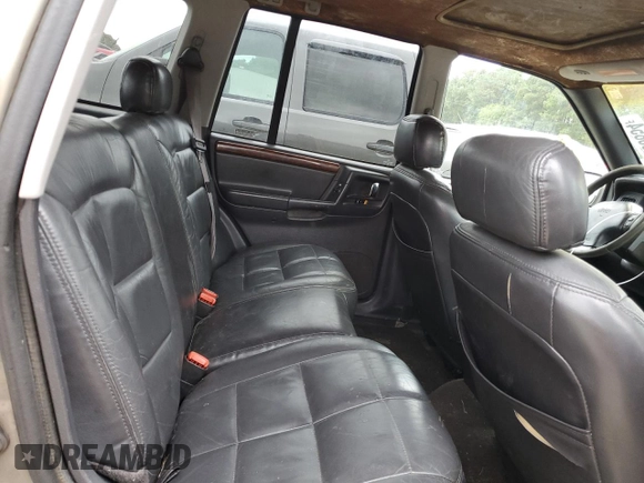 1997 Jeep Grand Cherokee Limited with VIN 1J4GZ78Y0VC599554, listed as a Copart auction lot 72006854 with 321,283 mi miles and Salvage Title. Bid and sale history available at carsss.com. Image 11.