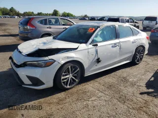 2024 Honda Civic Touring z VIN 2HGFE1F94RH313375, wystawiony jako Copart lot #54844905 z przebiegiem Nie podano mil oraz Szkoda całkowita • Salvage title. Historia ofert i sprzedaży dostępna na DreamBid. Obrazek 1.