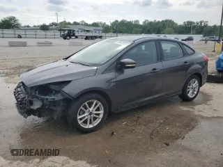 2017 Ford Focus SE with VIN 1FADP3F29HL267516, listed as a Copart auction lot 56984255 with 98,861 mi miles and Salvage title. Bid and sale history available at DreamBid. Image 1.