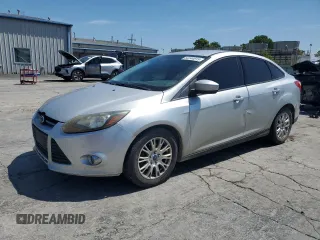 2012 Ford Focus SE with VIN 1FAHP3F24CL395382, listed as a Copart auction lot 64044815 with 152,198 mi miles and Salvage title. Bid and sale history available at DreamBid. Image 1.