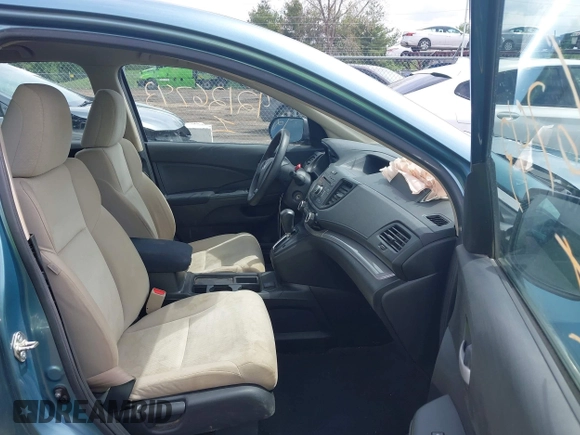 2015 Honda CR-V LX with VIN 2HKRM4H37FH601922, listed as a IAAI auction lot 42126743 with 165,764 mi miles and . Bid and sale history available at DreamBid. Image 5.