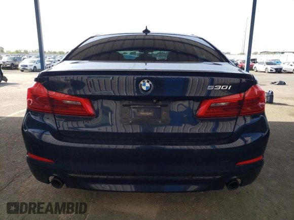 2018 BMW 5 Series 530i z VIN WBAJA5C50JG898675, wystawiony jako Copart lot #51188145 z przebiegiem Nie podano mil oraz Szkody całkowita. Historia ofert i sprzedaży dostępna na DreamBid. Obrazek 6.