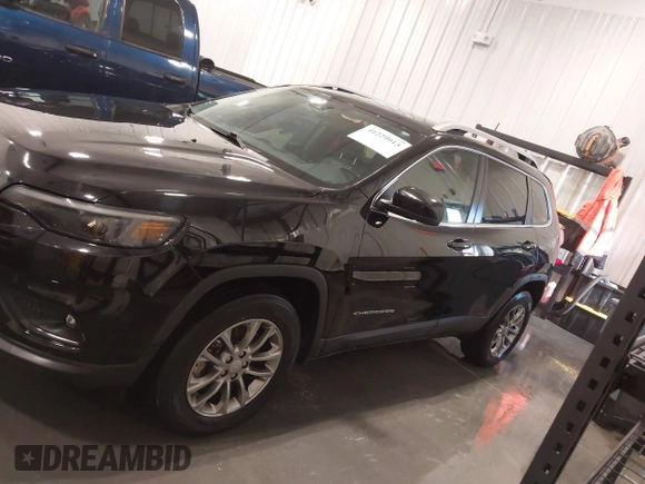 2021 Jeep Cherokee Latitude Lux with VIN 1C4PJMMX2MD107902, listed as a IAAI auction lot 41229913 with 61,195 mi miles and . Bid and sale history available at DreamBid. Image 14.