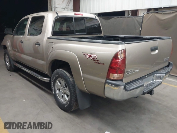 2005 Toyota Tacoma PreRunner z VIN 5TEJU62N65Z094557, wystawiony jako IAAI lot #41990607 z przebiegiem 109 219 mil mil oraz . Historia ofert i sprzedaży dostępna na DreamBid. Obrazek 3.