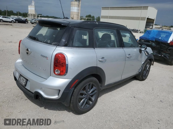2014 MINI Countryman S with VIN WMWZC5C55EWM18087, listed as a Copart auction lot 68661614 with Not provided miles and Salvage title. Bid and sale history available at DreamBid. Image 3.