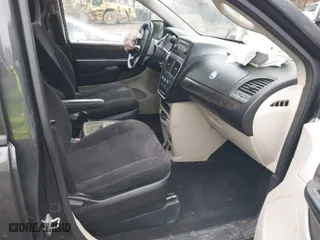 2011 Dodge Grand Caravan Express with VIN 2D4RN4DG2BR731905, listed as a IAAI auction lot 40701611 with 128,699 mi miles. Bid and sale history available at carsss.com. Image 5.