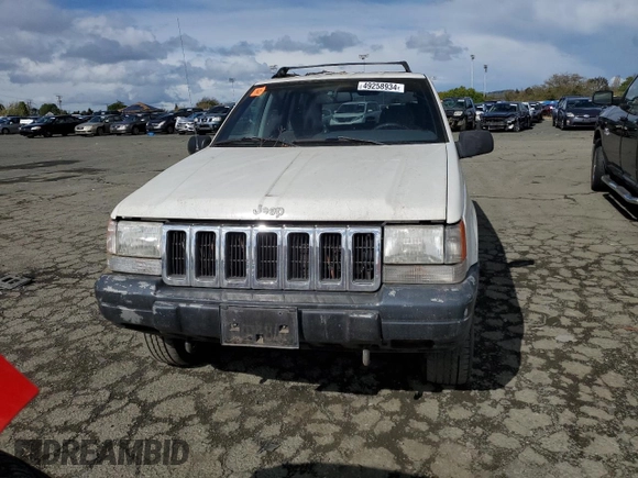 1997 Jeep Grand Cherokee Laredo with VIN 1J4GZ58S8VC647415, listed as a Copart auction lot 49258934 with 0 mi miles and Salvage Title. Bid and sale history available at carsss.com. Image 5.