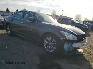 2012 Infiniti M with VIN JN1BY1AP9CM331047, listed as a Copart auction lot 49730015 with 125,263 mi miles and Salvage Title. Bid and sale history available at DreamBid. Image 4.