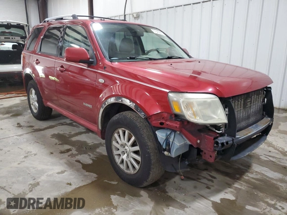 2008 Mercury Mariner Premier z VIN 4M2CU97118KJ52951, wystawiony jako Copart lot #61640225 z przebiegiem 186 109 mil mil oraz Szkoda całkowita • Salvage title. Historia ofert i sprzedaży dostępna na DreamBid. Obrazek 4.
