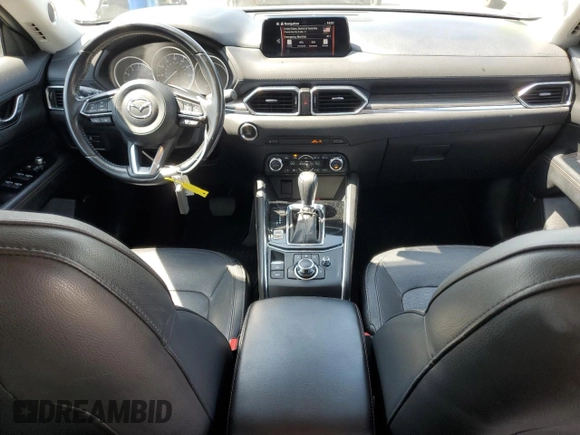 2018 Mazda CX-5 Grand Touring with VIN JM3KFBDM4J0348165, listed as a Copart auction lot 62733665 with 80,693 mi miles and Salvage title. Bid and sale history available at DreamBid. Image 8.