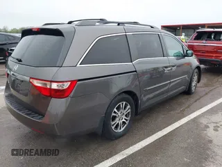 2012 Honda Odyssey EX-L with VIN 5FNRL5H6XCB032366, listed as a IAAI auction lot 41943625 with 73,236 mi miles and . Bid and sale history available at carsss.com. Image 4.