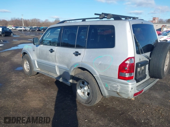2003 Mitsubishi Montero z VIN JA4NW31S93J037224, wystawiony jako IAAI lot #41848661 z przebiegiem 206 151 mil mil oraz . Historia ofert i sprzedaży dostępna na DreamBid. Obrazek 3.