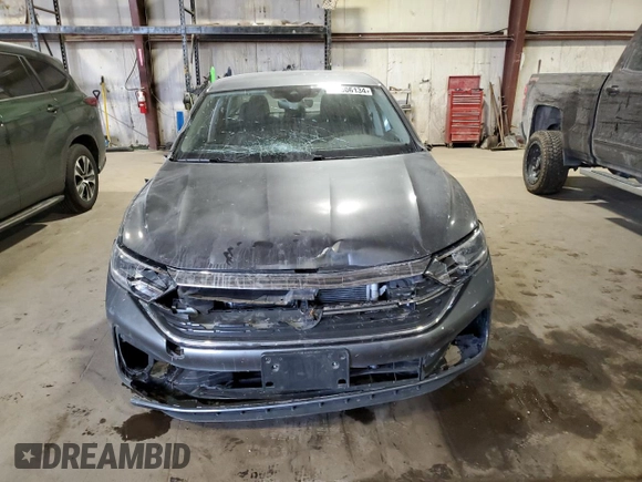 2023 Volkswagen Jetta S with VIN 3VW4M7BU7PM026209, listed as a Copart auction lot 83806134 with 9,427 mi miles and Salvage title. Bid and sale history available at DreamBid. Image 5.