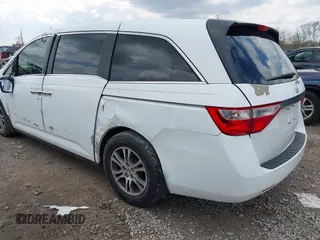 2012 Honda Odyssey EX-L with VIN 5FNRL5H67CB082903, listed as a IAAI auction lot 42015904 with 208,300 mi miles and . Bid and sale history available at carsss.com. Image 3.