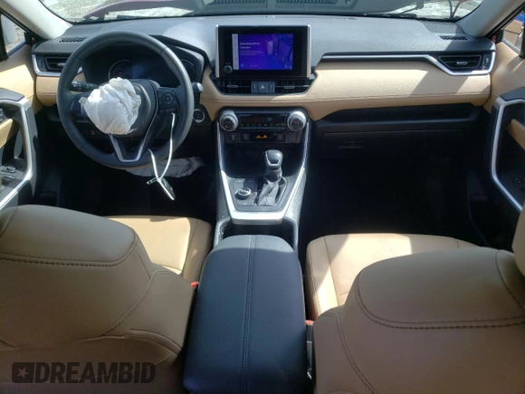 2023 Toyota RAV4 Hybrid XLE Premium with VIN JTMB6RFV2PD541262, listed as a Copart auction lot 60106845 with 32,447 mi miles and Salvage title. Bid and sale history available at DreamBid. Image 8.