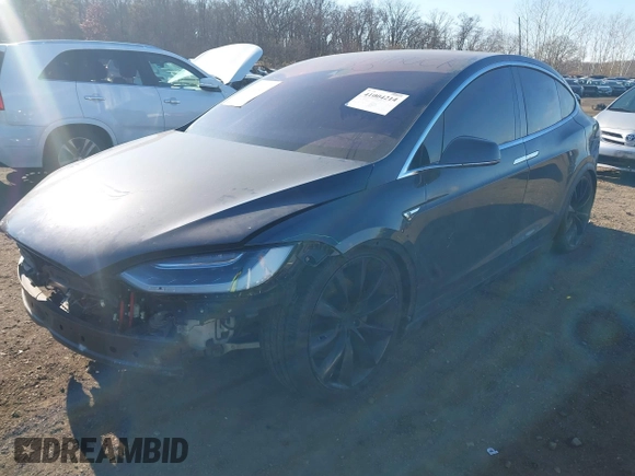 2016 Tesla Model X 70D z VIN 5YJXCAE28GF004461, wystawiony jako IAAI lot #41004214 z przebiegiem 158 962 mil mil oraz . Historia ofert i sprzedaży dostępna na DreamBid. Obrazek 2.