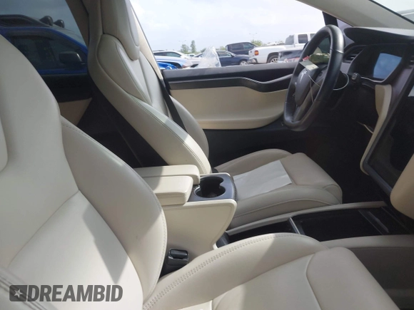 2018 Tesla Model X 75D with VIN 5YJXCDE21JF139712, listed as a IAAI auction lot 41905326 with Not Provided miles and . Bid and sale history available at carsss.com. Image 5.