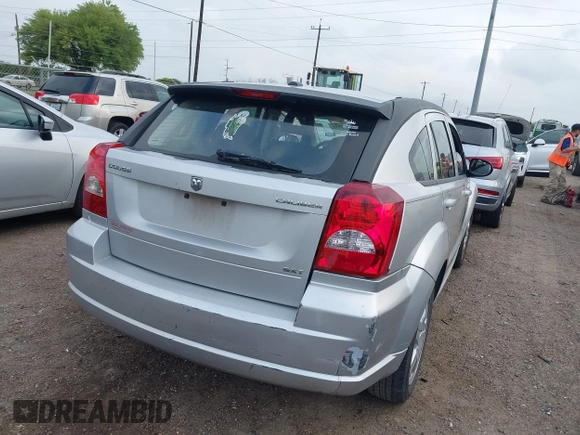 2009 Dodge Caliber SXT with VIN 1B3HB48A59D143888, listed as a IAAI auction lot 42110334 with 182,674 mi miles and . Bid and sale history available at DreamBid. Image 4.