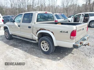 2002 Dodge Dakota SLT with VIN 1B7HG48N82S616607, listed as a IAAI auction lot 41837480 with 328,430 mi miles. Bid and sale history available at carsss.com. Image 3.