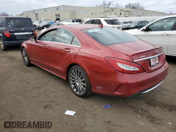 2015 Mercedes-Benz CLS 400 with VIN WDDLJ6HB4FA153587, listed as a Copart auction lot 87486774 with 76,854 mi miles and Salvage title. Bid and sale history available at DreamBid. Image 2.