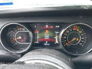 2022 Jeep Gladiator High Altitude with VIN 1C6HJTFG0NL105043, listed as a IAAI auction lot 41290790 with 73,595 mi miles and . Bid and sale history available at DreamBid. Image 7.