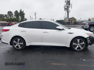 2020 Kia Optima LX with VIN 5XXGT4L32LG426259, listed as a IAAI auction lot 41569308 with 114,656 mi miles. Bid and sale history available at carsss.com. Image 13.