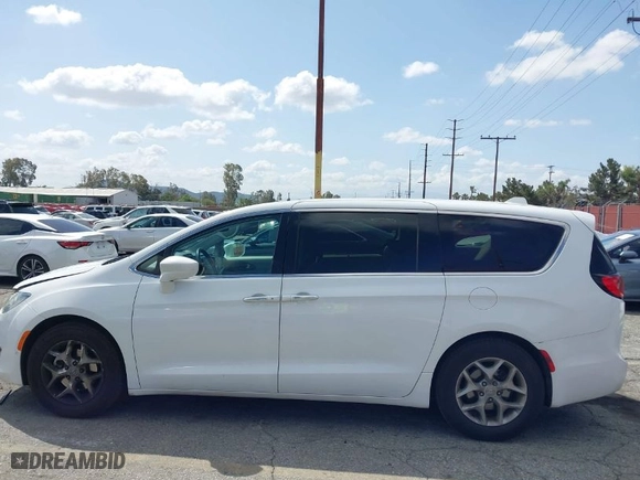 2019 Chrysler Pacifica Touring Plus with VIN 2C4RC1FG0KR629050, listed as a IAAI auction lot 41949260 with 143,879 mi miles. Bid and sale history available at carsss.com. Image 14.