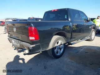 2014 Ram 1500 Tradesman with VIN 1C6RR6KT9ES112936, listed as a IAAI auction lot 41811778 with 147,654 mi miles. Bid and sale history available at carsss.com. Image 4.