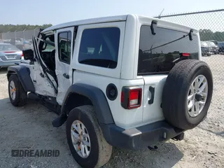 2023 Jeep Wrangler Willys z VIN 1C4HJXDG9PW545749, wystawiony jako IAAI lot #42307373 z przebiegiem 44 176 mil mil oraz . Historia ofert i sprzedaży dostępna na DreamBid. Obrazek 3.