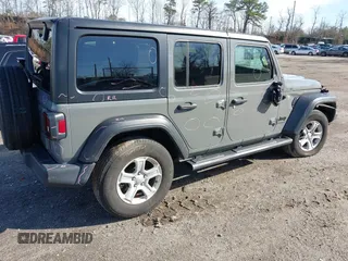 2022 Jeep Wrangler Unlimited Willys with VIN 1C4HJXDN2NW267658, listed as a IAAI auction lot 41858229 with 24,307 mi miles and . Bid and sale history available at DreamBid. Image 4.