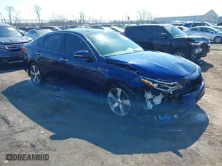 2019 Kia Optima LX with VIN 5XXGT4L35KG303814, listed as a IAAI auction lot 41769183 with 107,509 mi miles. Bid and sale history available at carsss.com. Image 1.