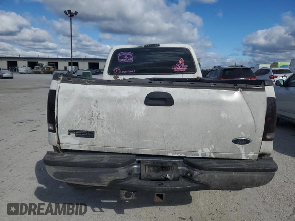 1999 Ford F-250 XL z VIN 1FTNF21F4XEC81851, wystawiony jako Copart lot #75865864 z przebiegiem 260 042 mil mil oraz Czysty tytuł • Clean title. Historia ofert i sprzedaży dostępna na DreamBid. Obrazek 10.
